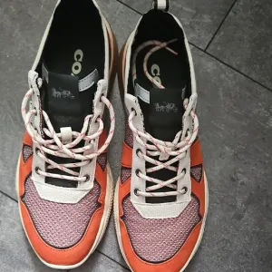 Coach Orange and White Athletic Shoes with Mesh Upper