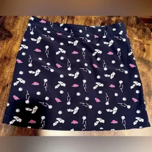 IZOD Golf | ladies golf print skort. Size: 8