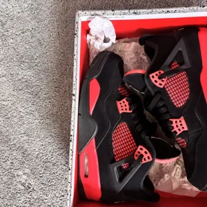 Jordan Black and Red Athletic Shoes with Classic Design