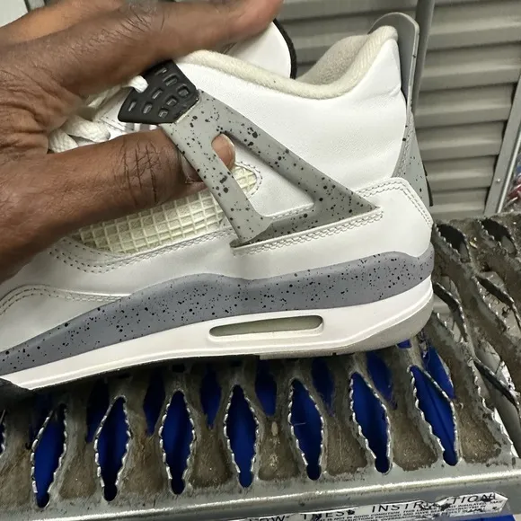Jordan White and Black Air Jordan 4 Sneakers