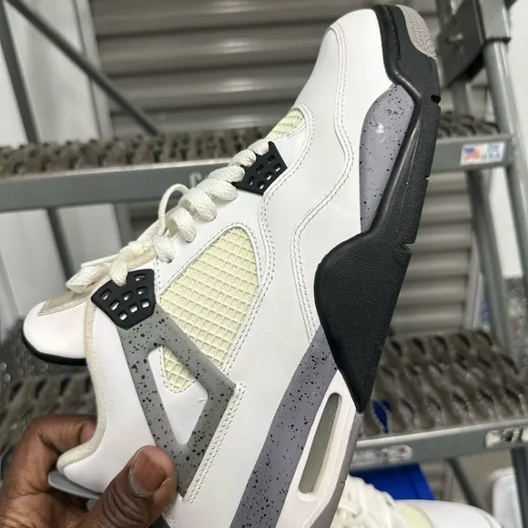 Jordan White and Black Air Jordan 4 Sneakers