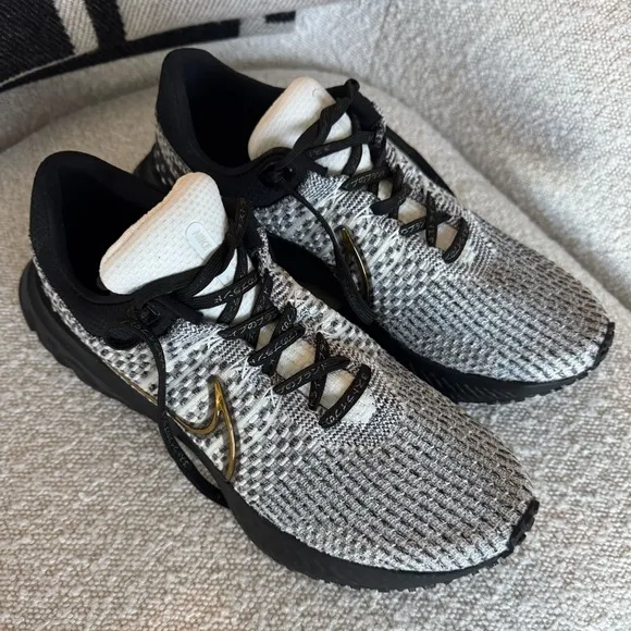 Nike Athletic Shoes Black and White with Gold Accents
