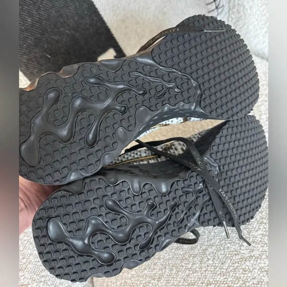 Nike Athletic Shoes Black and White with Gold Accents