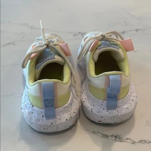 Nike Cream and Blue Athletic Shoes with Modern Design