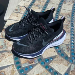 Nike Invincible Run 3 Black and White Athletic Shoes with Modern Design