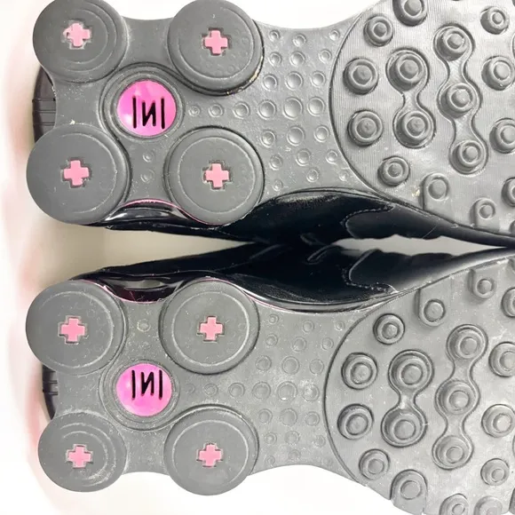 Nike Women Pink and Black Sneakers with Cloud pattern - Size 9