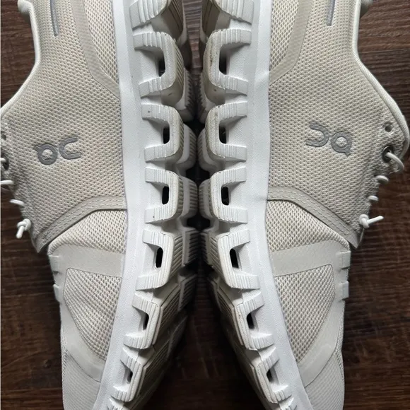 On Running Cream Athletic Shoes with Streamlined Design