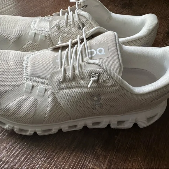 On Running Cream Athletic Shoes with Streamlined Design