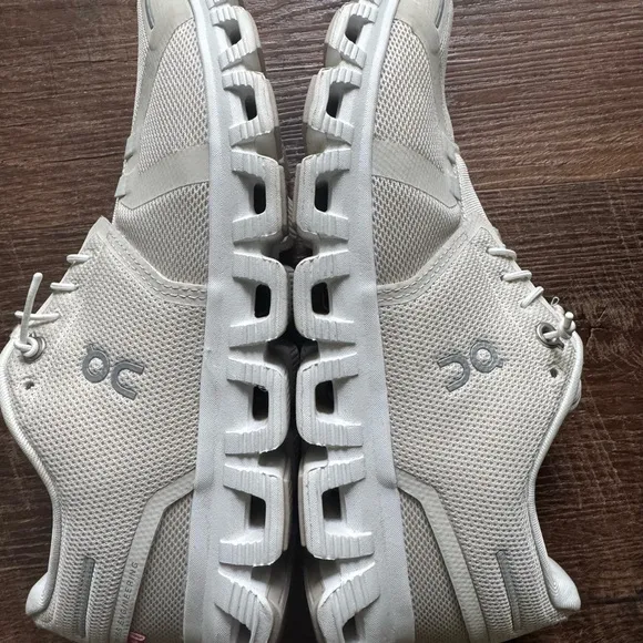 On Running Cream Athletic Shoes with Streamlined Design