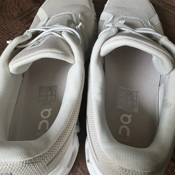 On Running Cream Athletic Shoes with Streamlined Design