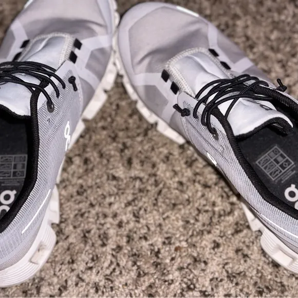On Running Gray and Black Sneakers with Mesh Upper