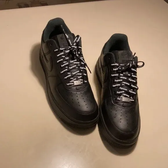 Supreme Black Athletic Shoes with Rugged Design