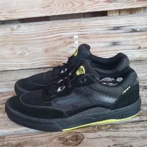 Vans Black and Yellow Sneakers with Neon Accents